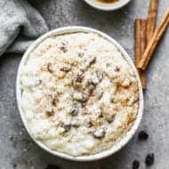 Arroz con leche served in a bowl, with a sprinkle of cinnamon on top.