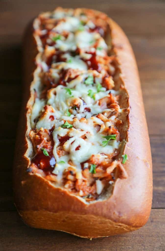 BBQ Chicken Stuffed Bread with melted cheese on top.