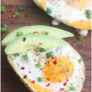 Breakfast Potato Boats with Canadian bacon, peppers, cheese and a baked egg. | Tastes Better From Scratch