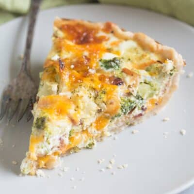 Easy Broccoli Cheese Quiche made in my favorite homemade pie crust. Family and friends alike love this easy brunch recipe!