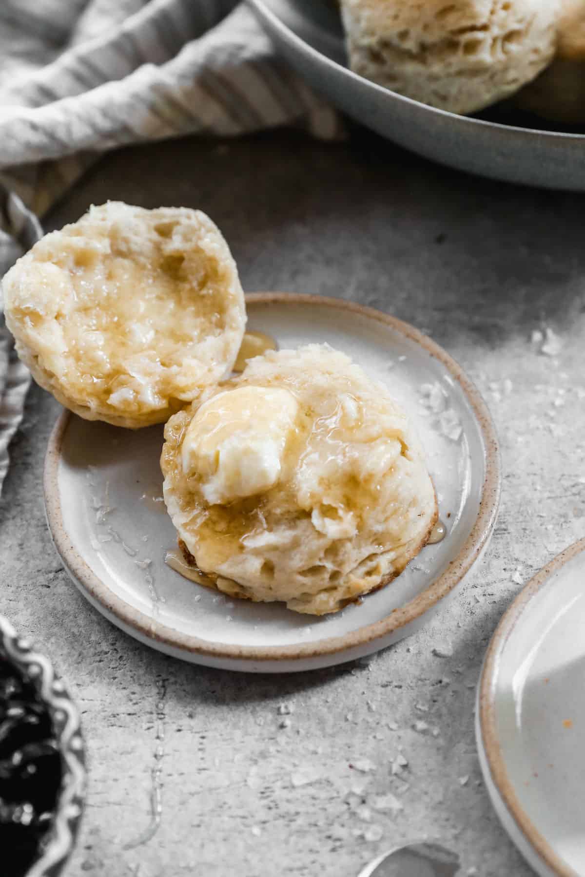 An easy Biscuit, broken in half and slathered with butter and honey. 