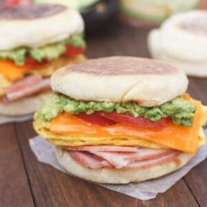 Cheesy Egg, Avocado and Ham Breakfast Sandwiches are perfect for using your leftover ham! They also make the best, easy freezer meals. | Tastes Better From Scratch