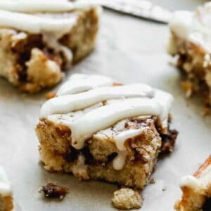 Slices of cinnamon roll cake served on a platter.