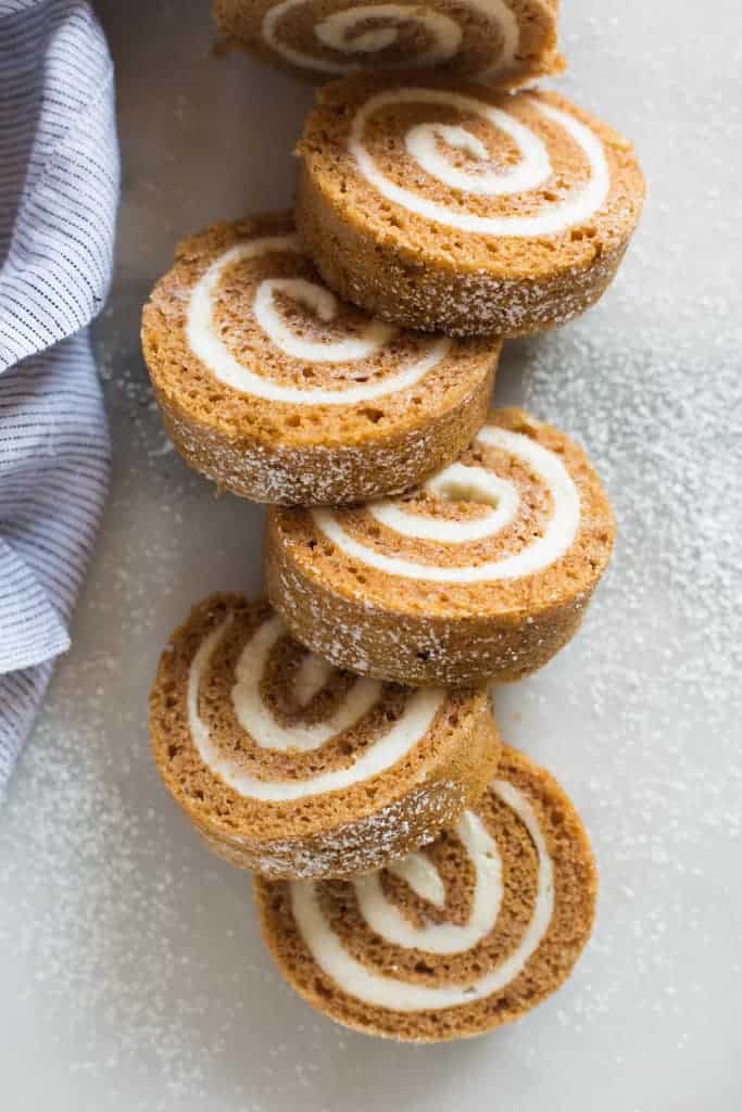 Making a classic pumpkin roll has never been easier with this handy trick! We love this beautiful, simple dessert. Pumpkin cake with a cream cheese filling | tastesbetterfromscratch.com