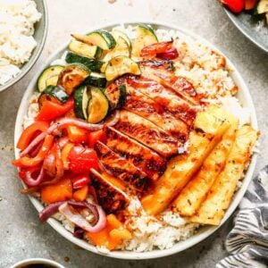 Hawaiian Bowls with coconut rice, grilled vegetables, teriyaki chicken and pineapple spears.