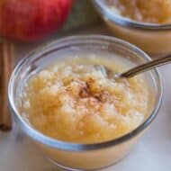 A bowl of homemade applesuace with cinnamon, made from the instant pot.