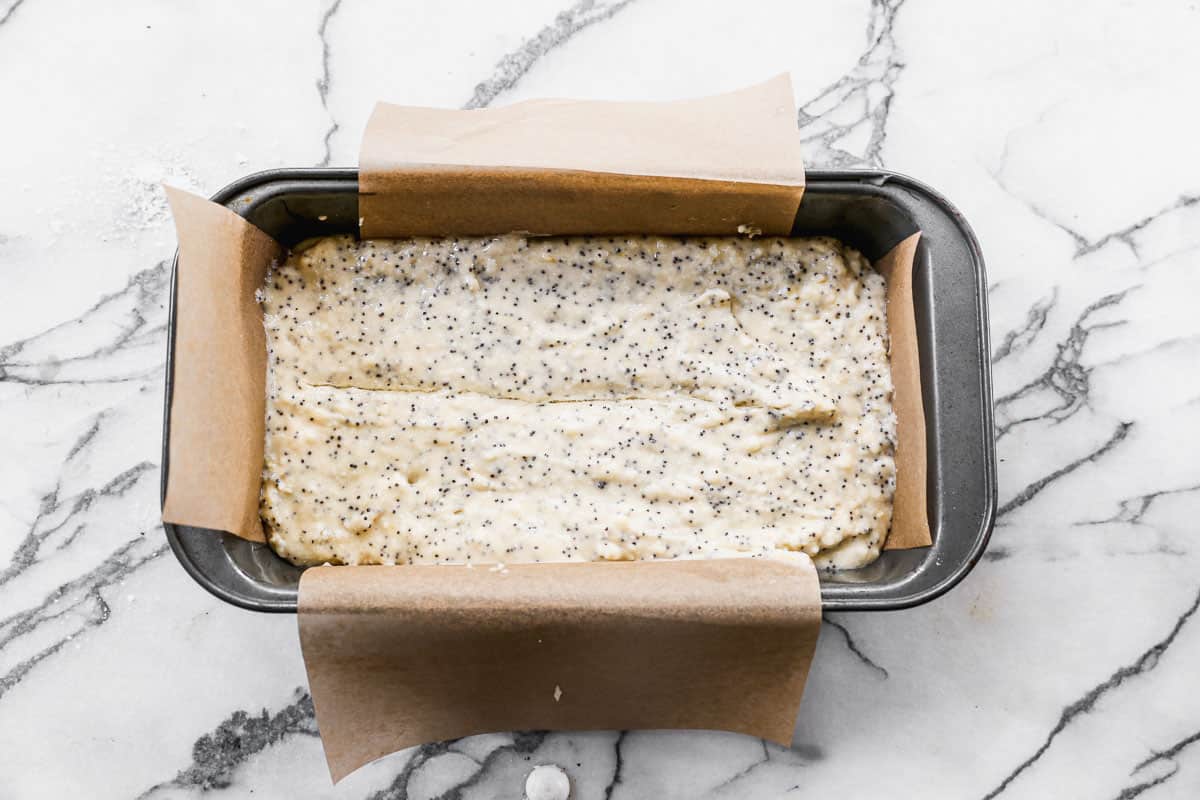 Lemon Poppy Seed Bread in a loaf pan, ready to bake.