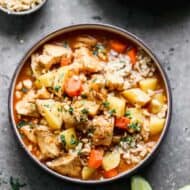 Massaman Curry served in a bowl garnished with chopped peanuts.