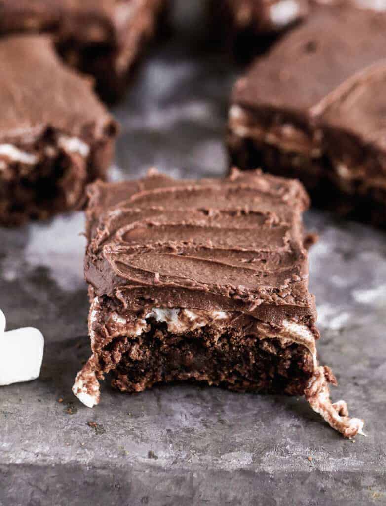 A Mississippi Mud Brownie on a baking sheet with other cut brownies.