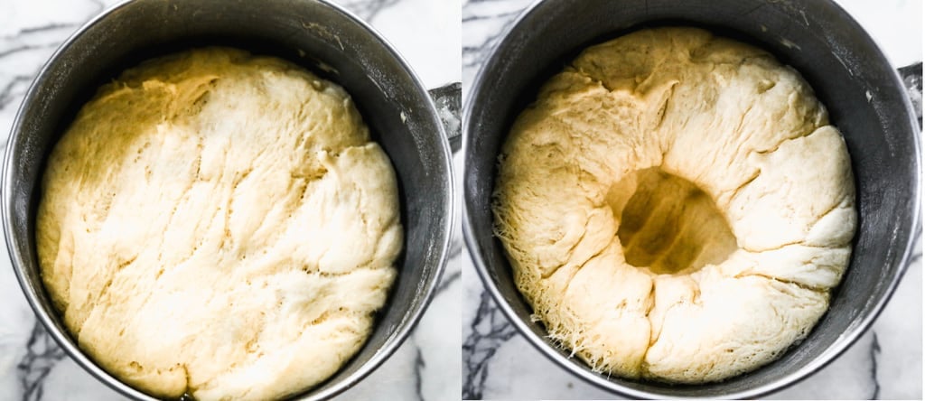 A mixing bowl with risen dough for cinnamon rolls.