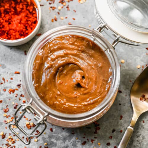 A container of homemade peanut sauce.