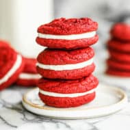 Three easy Red Velvet Cookies stacked on top of each other.