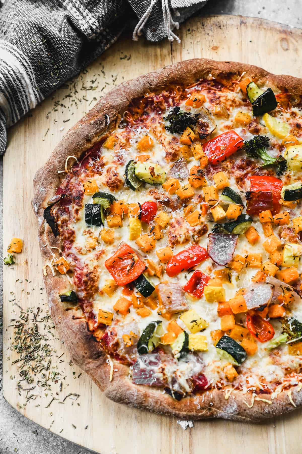 An easy wheat pizza dough recipe made into a delicious vegetarian pizza.